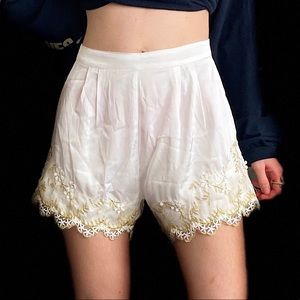 High waisted eggie white shorts with gold details